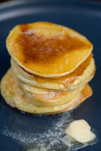 istock milk pancakes with butter on a blue plate 2168186758