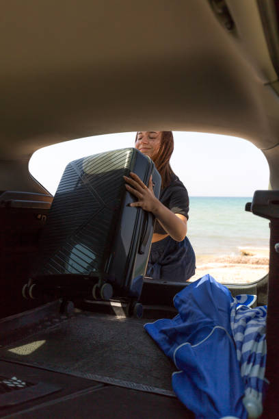 istock Travel essentials in a large suitcase 2168187612
