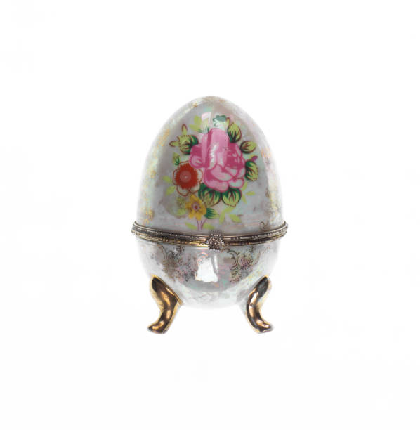 istock decorative porcelain egg with floral ornament isolated on white background 2168190012