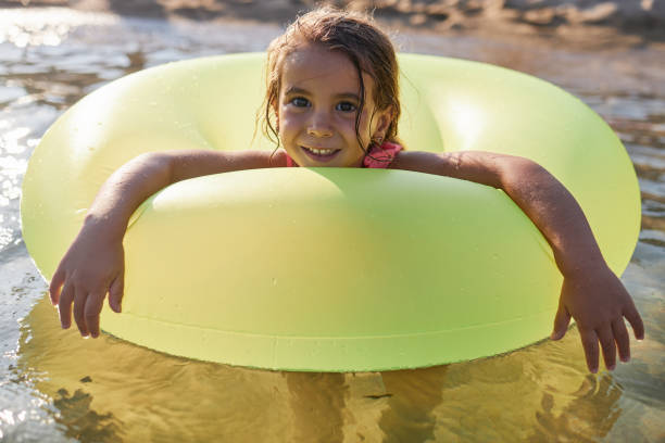 istock Beautiful girl enjoying summer vacation 2168192350