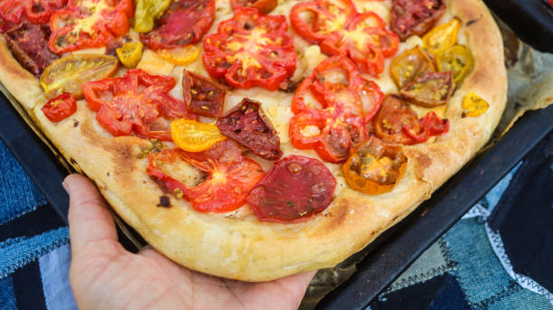 istock pie bread baked in the oven with tomatoes delicious 2168193639