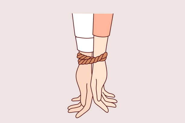Tied hands of people in toxic relationships symbolize communication problems among men and women Tied hands of people in toxic relationships symbolize communication problems among men and women in love. Toxic relationships in unhappy couple forced to feel mutually dependent on partner ropes tied together stock illustrations