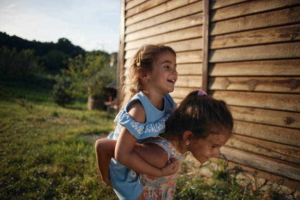 istock Beautiful children enjoying outdoors 2168199255