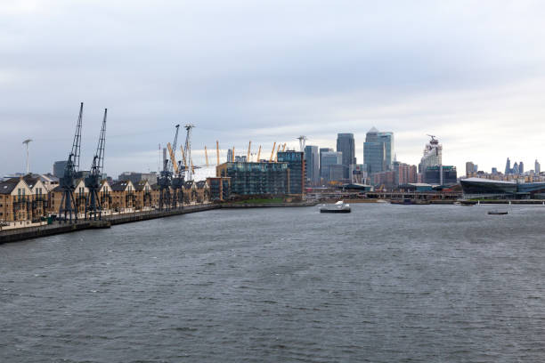 istock London Docklands with Canary Wharf and Historic Cranes 2168203499