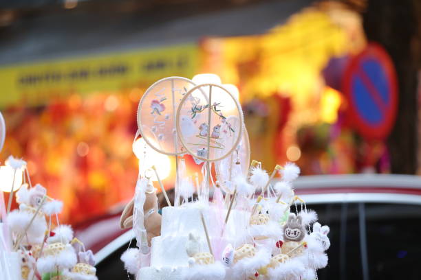 Mid-Autumn Festival Comes Early on Hang Ma StreetThis year's Mid-Autumn Festival, Hang Ma Street has once again become the center of attraction for locals and tourists with its colorful space of lanterns and traditional toys.Although it is still nearly a month until the Mid-Autumn Festival, Hang Ma Street these days is sparkling and brilliant with the colors of thousands of traditional Mid-Autumn toys covering the street.