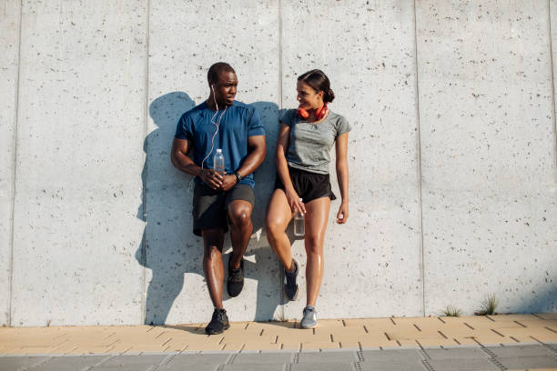 After a long run, friends pause to rest