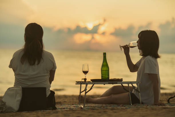 Young generation living in Asia spending time with friends and family at the beach