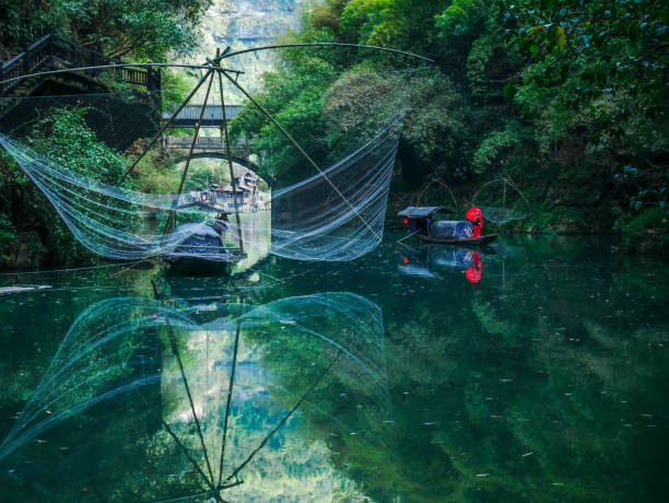 Man fishing in dry river