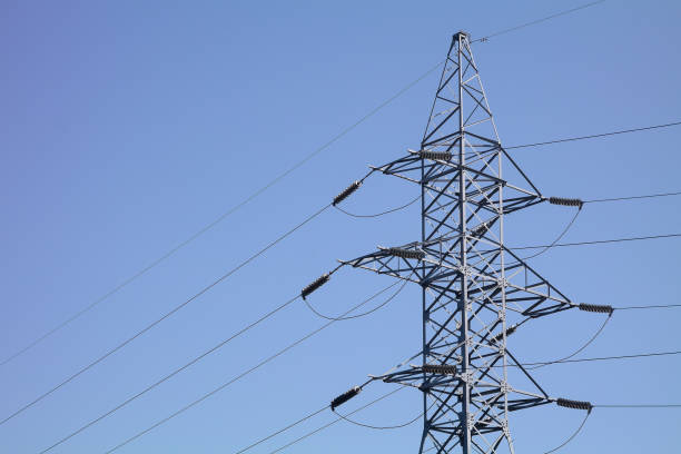 istock Iron power line pole against the sky, electricity and technology. 2168220145