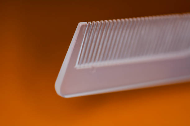 Concept of a transparent hair comb isolated