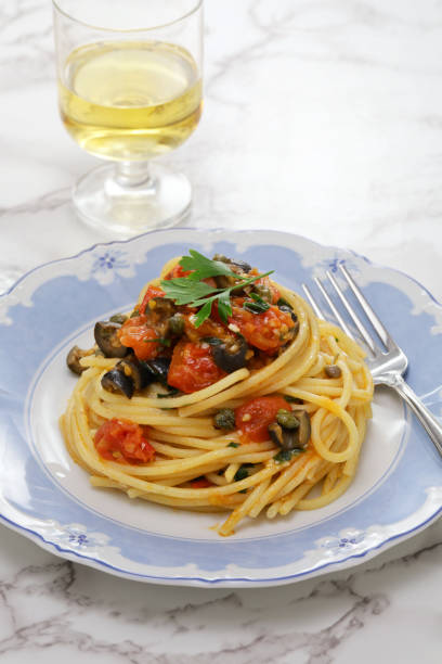 istock spaghetti alla puttanesca, an Italian Napoli traditional pasta dish 2168227251