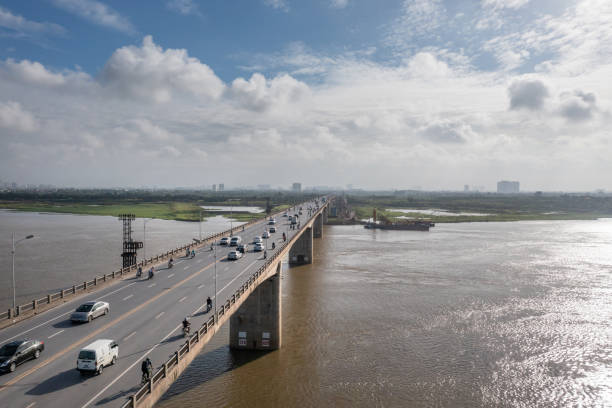 istock Vinh Tuy bridge crossing Red river in Hanoi 2168230075