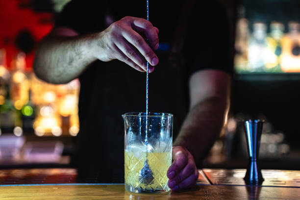 istock Close-up of a skilled bartender preparing drinks at the night bar 2168238705