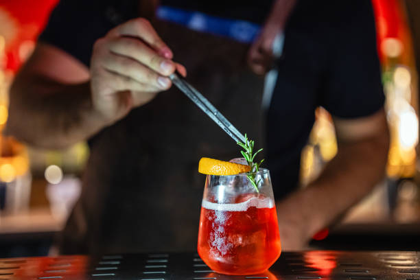 istock Close-up of a skilled bartender preparing drinks at the night bar 2168238935