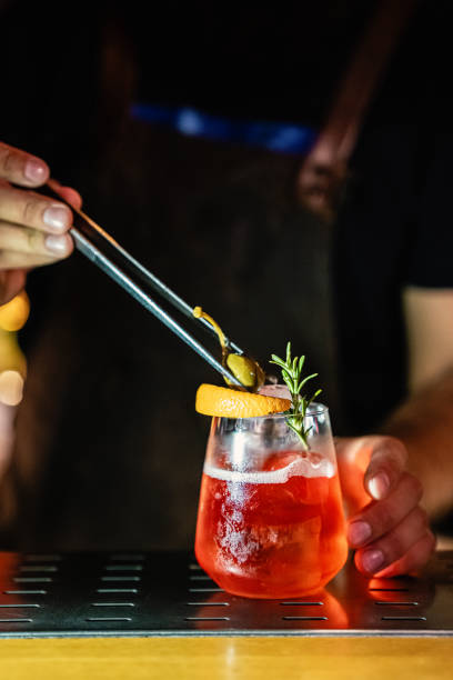istock Close-up of a skilled bartender preparing drinks at the night bar 2168238961