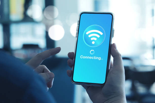 istock Man using smartphone connects to wireless fidelity (Wi-Fi) internet on smartphone. 2168239172