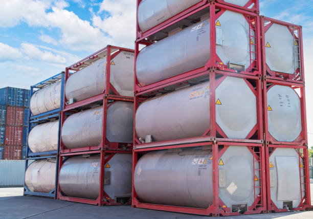Cylinder tank cargo containers with metal frame in a port.