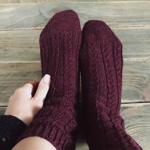 istock knitted burgundy socks 2168247354