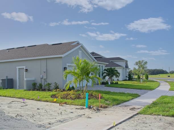 istock Recently completed Florida new home construction with vacant lot next door 2168250858