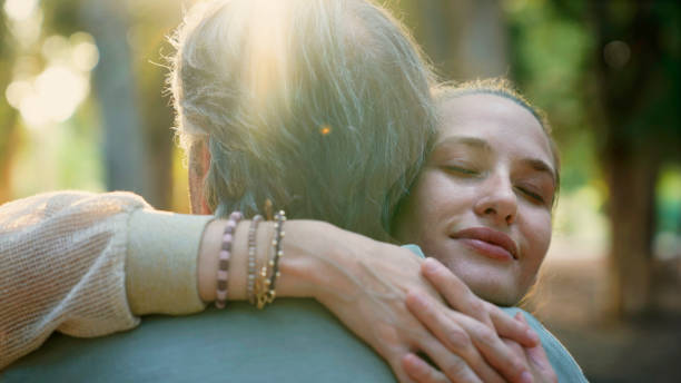 istock Young daughter hugging her father 2168253467