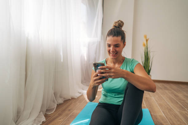 istock Young woman exercising Pilates at home. 2168257740