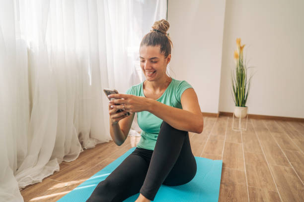 istock Young woman exercising Pilates at home. 2168257742
