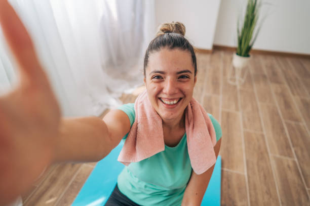 istock Young woman exercising Pilates at home. 2168258022