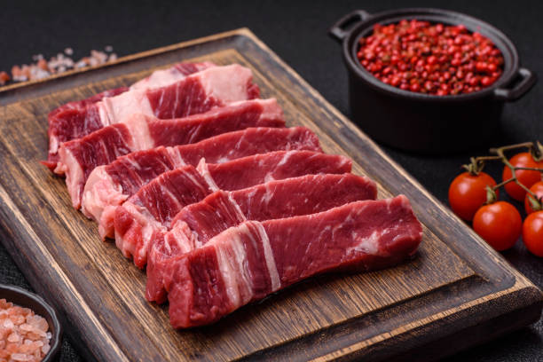 istock Fresh raw beef cut into slices with salt, spices 2168259274
