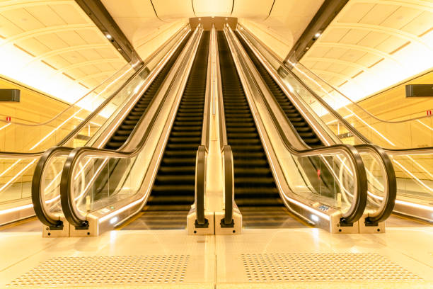 istock Modern Escalator in subway train station, background with copy space 2168261314