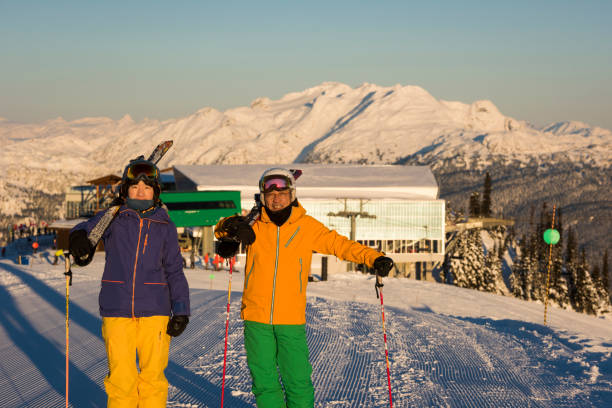 istock Skiing couple on mountain top 2168265949