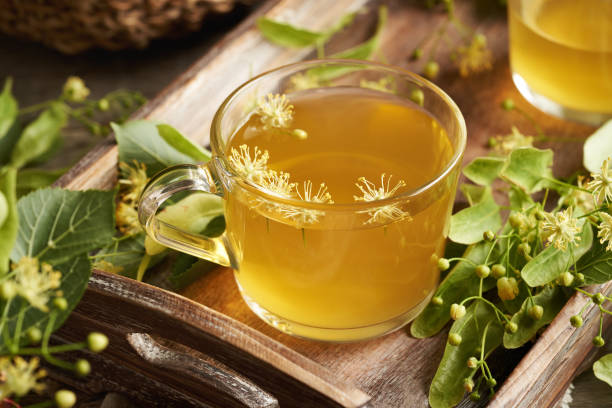 Linden flower tea in a glass cup