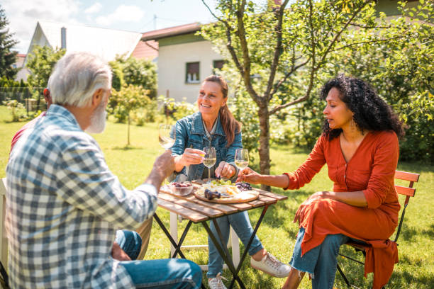 istock Joyful Senior Couples Sharing Moments on a Sunny Afternoon 2168291016