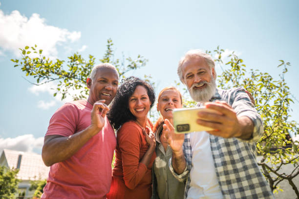 istock A Charming Man Taking a Selfie with His Senior Friends 2168291039