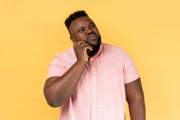 istock Man touching chin and thinking about important question, making hard decision. 2168291061