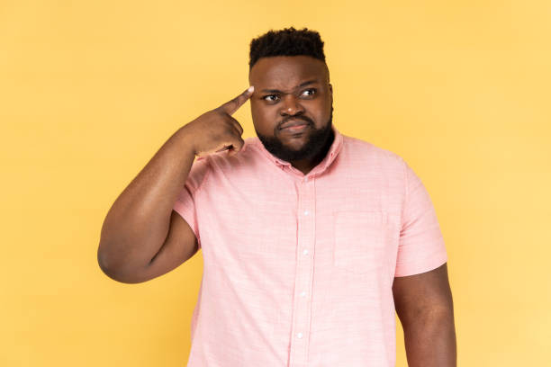 istock Man showing stupid gesture, looking at camera with condemnation and blaming for insane plan. 2168291079