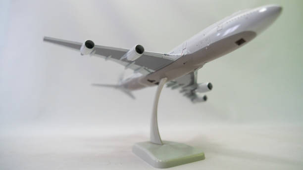istock holding passenger plane transportation toy 2168291849
