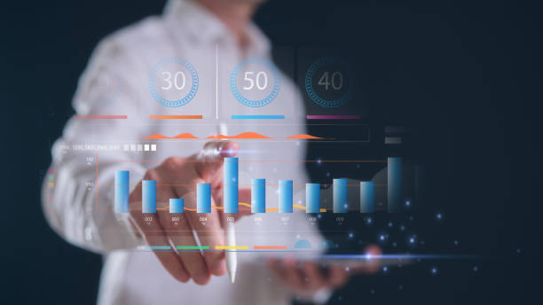 istock analyst holding smartphone analyse data chart investment and financial concept planning and strategy Stock market Business growth. Businessman trader using smartphone analysing on data charts 2168307062