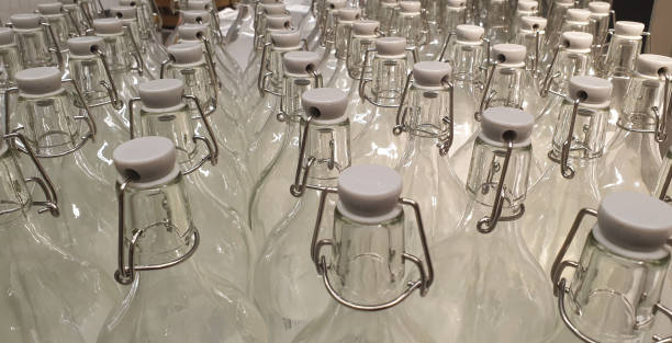istock glass bottles with lids for household use 2168323522