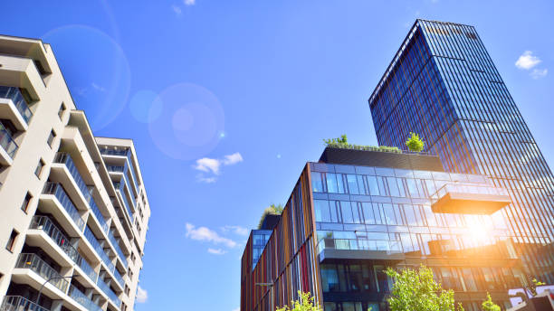 istock Sustainable glass office building with trees for reducing carbon dioxide. 2168331856