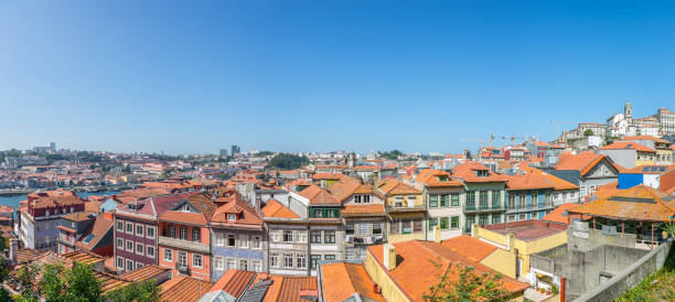 View over the old town of Porto, Portugal, with ancient buildings and traditional roofs (panorama)