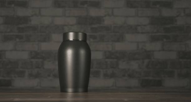 istock Decorative urn on the table with dark background. Panoramic image with copy space for your own content. 2168337019