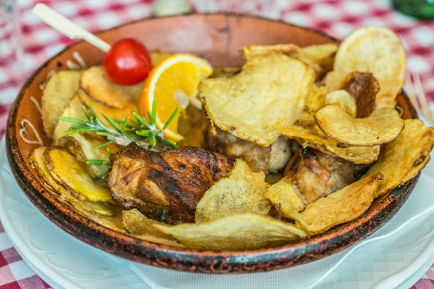istock Grilled chicken with potato chips from Portugal 2168337361