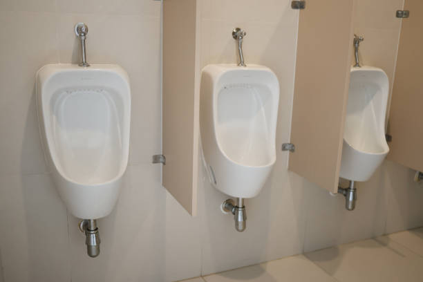istock White urinals in a men-s restroom. 2168340761