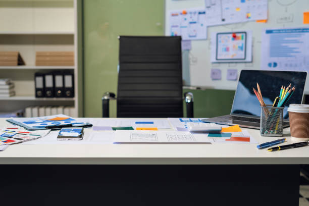 istock Workspace area with laptop tablet smartphone and paperwork on the table in the office concept. 2168341382