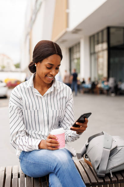 istock Scrolling through social media in the city 2168347898