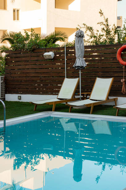 istock Luxury hotel swimming pool area 2168348506