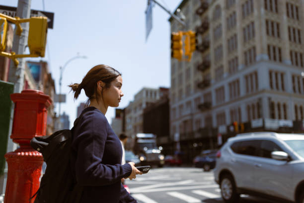 istock Commuter Crossing City Street 2168350537