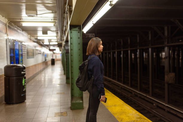 istock Waiting for the Train at Dusk 2168350563