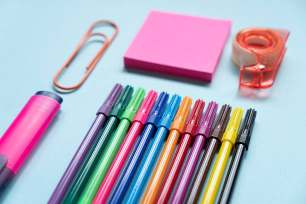 office supplies on blue background
