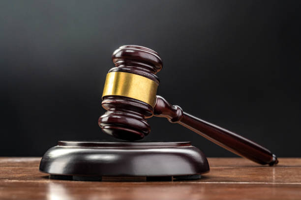 istock Judge's gavel on a table welly lit with black background 2168355144